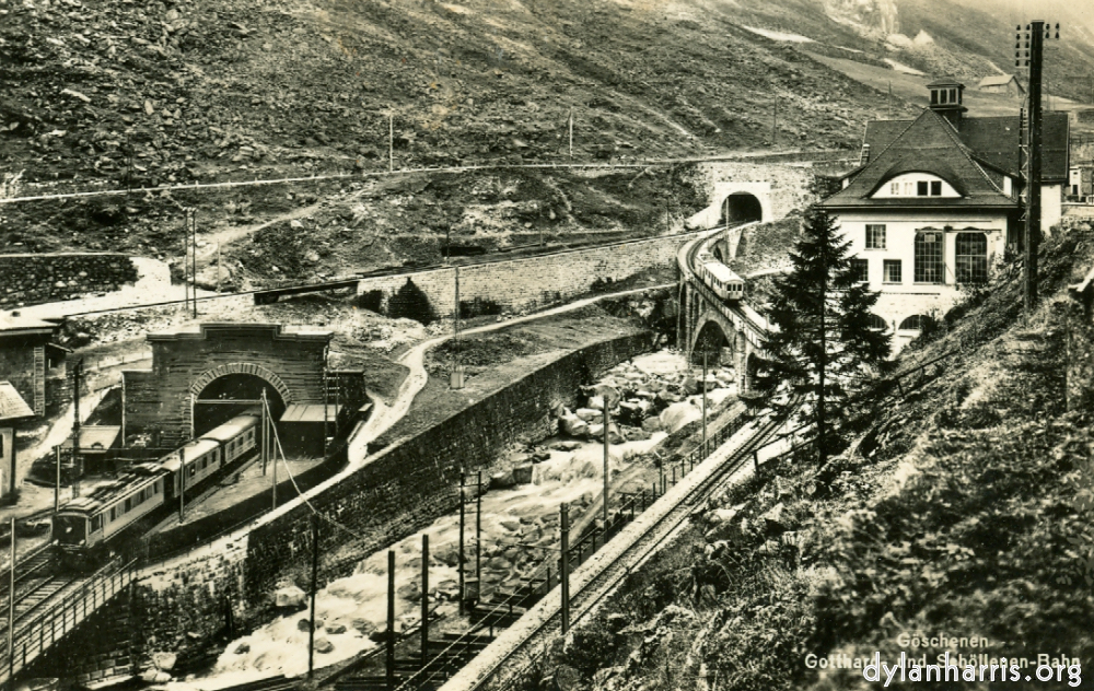 image: Postcard: Göschenen Gotthard und Schöllenen-Bahn [[ St. Gotthard Tunnel Göschenen Entrance with the Schöllenenbahn Rack Railway to Andermatt etc. ]]