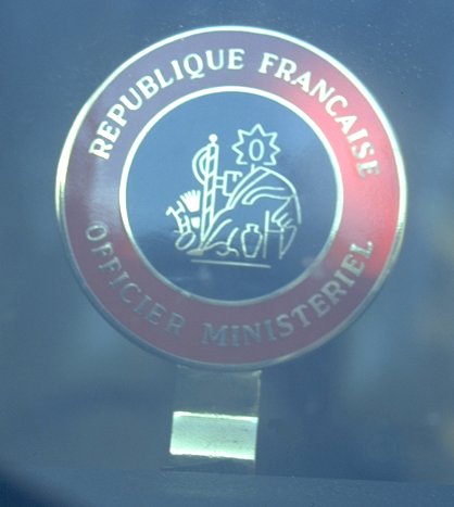 image: The car's badge of office