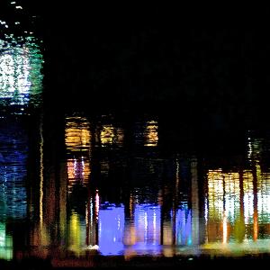 image: Reflections of shops in Antwerp Harbour