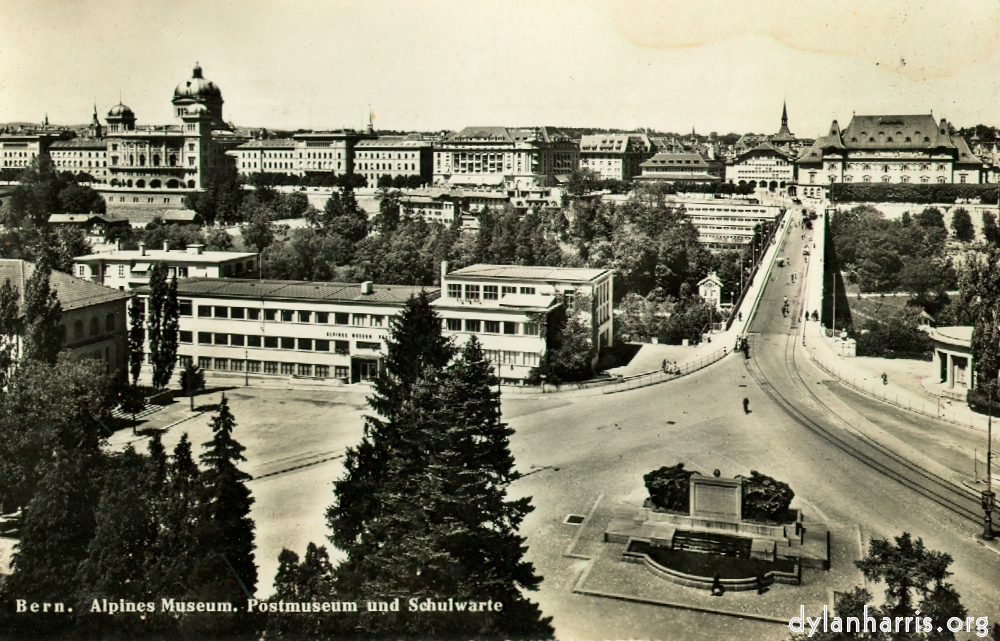 image: Postcard: Bern. Alpines Museum, Postmuseum und Schulwarte [[ The Houses of Parliament and Kuchenfeld Bridge from the Historical Museum. ]]