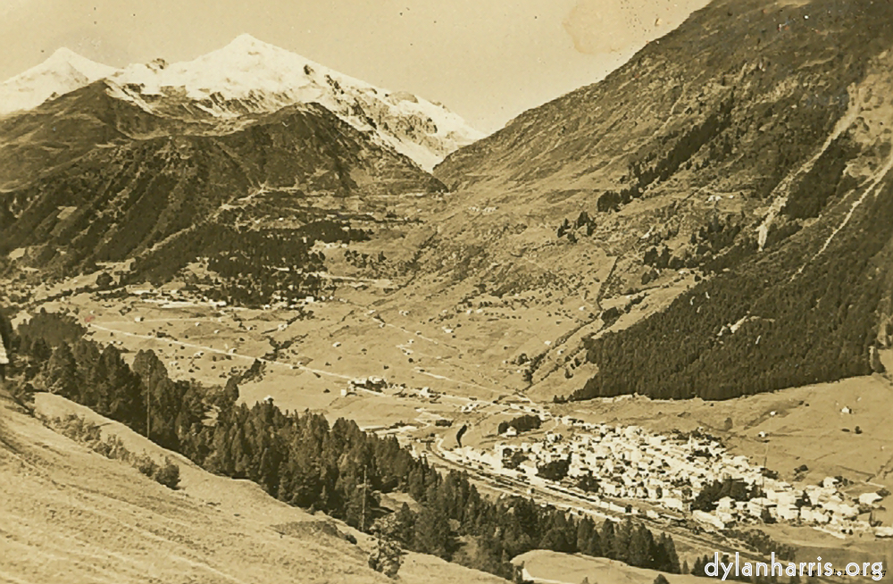 image: Postcard [[ The Southern Entrance to the St. Gotthard Pass including Airolo. ]]
