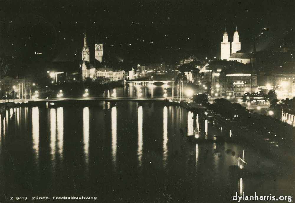 image: Postcard: Z 9412 Zürich. Festbeleuchtung [[ Zürich by Night and Day. With St Peter’s Church, the Urania Observatory and the Grossemünster, AD 100, a Cathedral. ]]