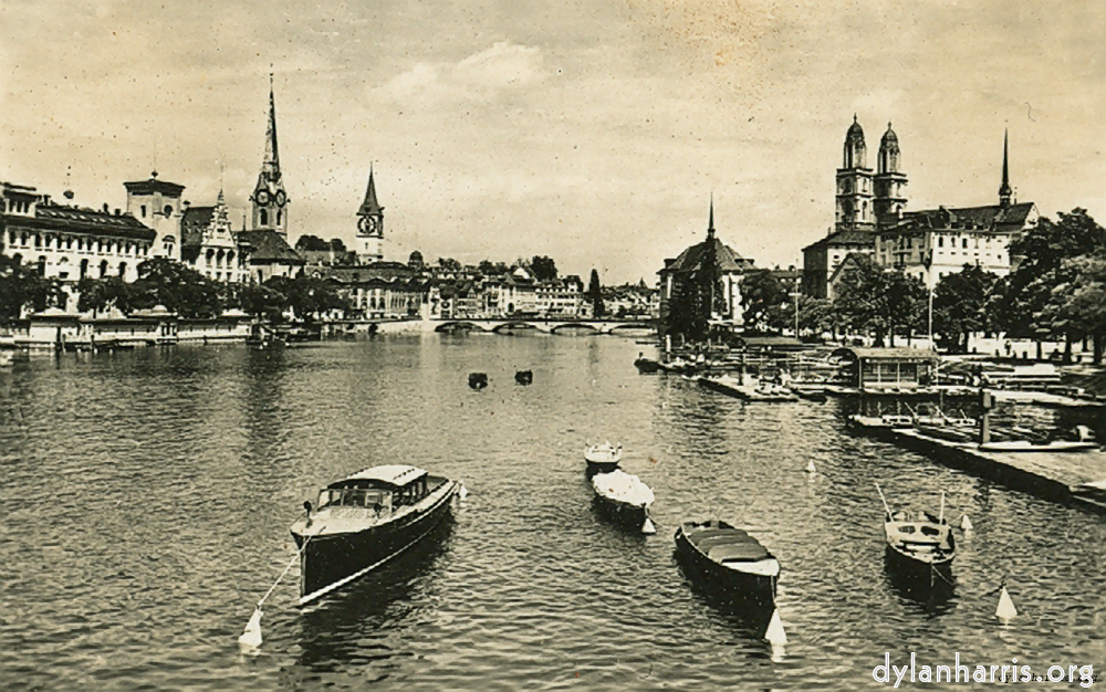 image: Postcard: Zürich by Night and Day. With St Peter’s Church, the Urania Observatory and the Grossemünster, AD 100, a Cathedral.